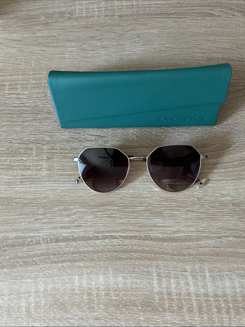 Paradigm Sunglasses with gold Frame